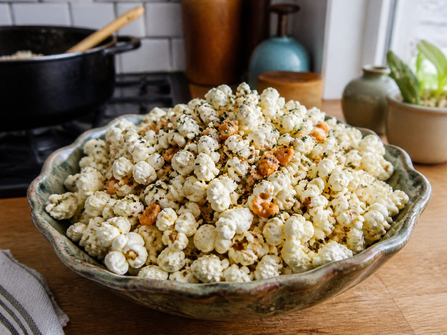 A big bowl of glossy furikake-dusted popcorn mixed with crunchy arare rice crackers